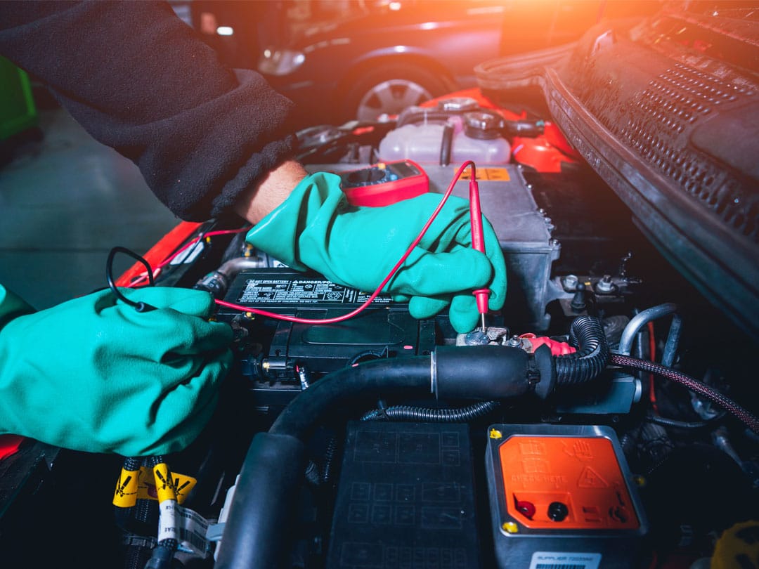 EV technician carrying out diagnostics