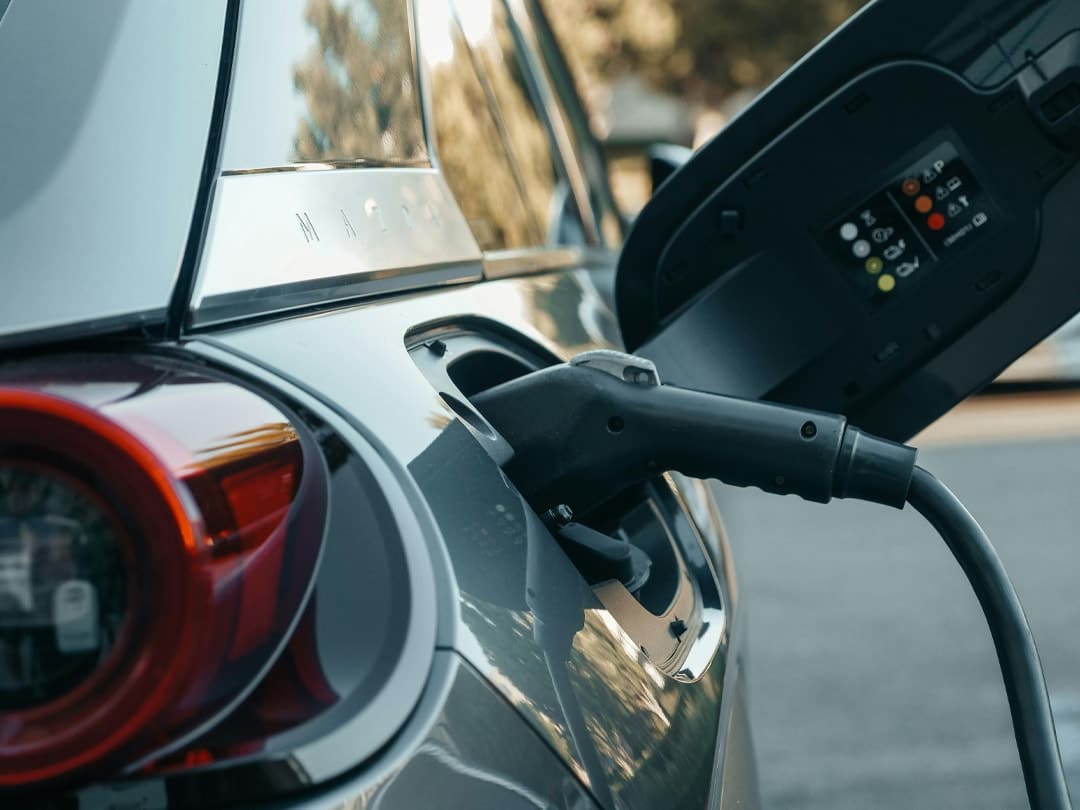 Electric Vehicle plugged into EV charging point